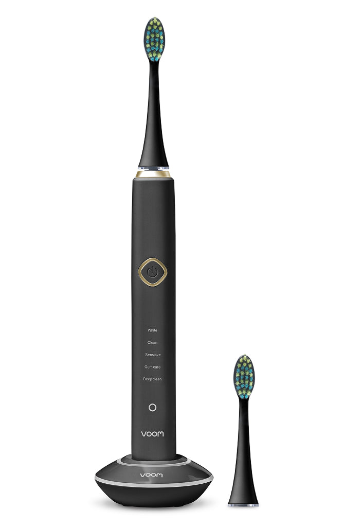 Black electric toothbrush with bristle display on a white background